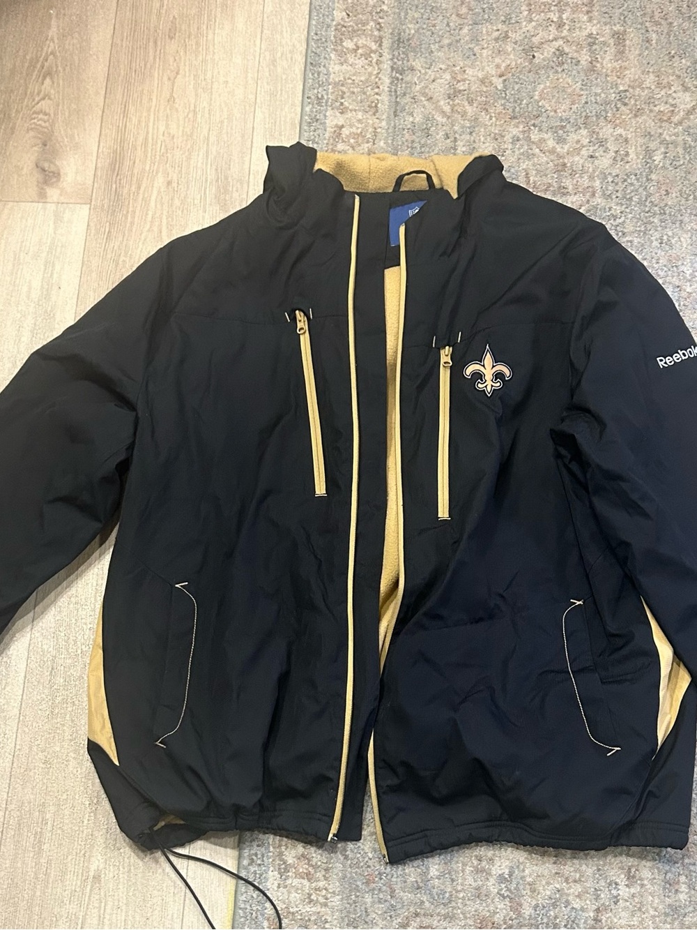 Reebok Black and Gold New Orleans Saints Hooded Performance Jacket
